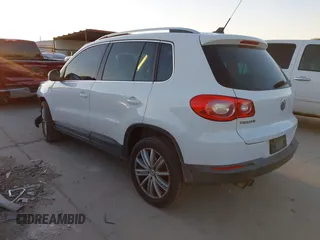 2010 Volkswagen Tiguan SEL with VIN WVGBV7AX4AW514362, listed as a IAAI auction lot 41413300 with 154,201 mi miles and . Bid and sale history available at DreamBid. Image 3.
