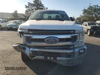 2022 Ford F-250 XL with VIN 1FTBF2B69NEE39910, listed as a Copart auction lot 73411214 with 16,123 mi miles and Salvage title. Bid and sale history available at DreamBid. Image 5.