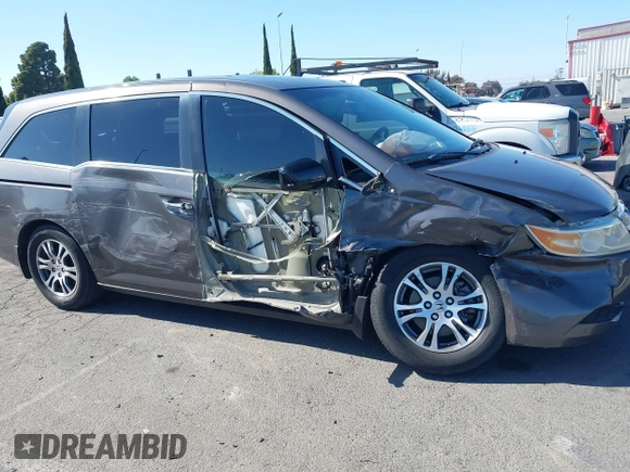 2011 Honda Odyssey EX-L with VIN 5FNRL5H68BB083492, listed as a IAAI auction lot 42087699 with 155,141 mi miles and . Bid and sale history available at carsss.com. Image 6.