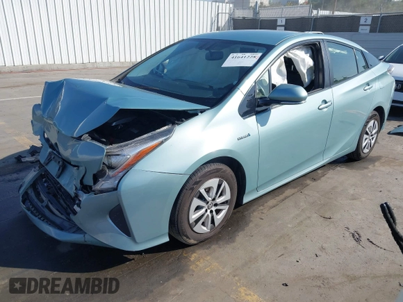 2016 Toyota Prius Four z VIN JTDKARFU6G3023120, wystawiony jako IAAI lot #41641228 z przebiegiem 117 334 mil mil oraz . Historia ofert i sprzedaży dostępna na DreamBid. Obrazek 2.