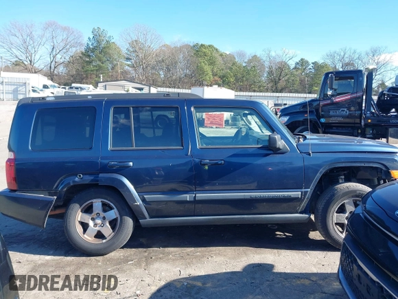 2009 Jeep Commander Sport with VIN 1J8HH48K29C530970, listed as a IAAI auction lot 41232353 with 280,000 mi miles and . Bid and sale history available at DreamBid. Image 14.