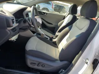 2019 Hyundai Ioniq SEL with VIN KMHC75LCXKU134128, listed as a Copart auction lot 44266015 with 59,390 mi miles and Salvage Title. Bid and sale history available at DreamBid. Image 7.