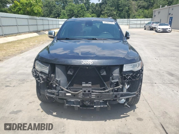 2015 Jeep Grand Cherokee Summit z VIN 1C4RJEJG7FC185426, wystawiony jako Copart lot #62562735 z przebiegiem 133 418 mil mil oraz Szkoda całkowita • Salvage title. Historia ofert i sprzedaży dostępna na DreamBid. Obrazek 5.