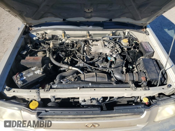 2000 Infiniti QX4 z VIN JNRAR07Y4YW085424, wystawiony jako Copart lot #81091324 z przebiegiem 202 157 mil mil oraz Szkoda całkowita • Salvage title. Historia ofert i sprzedaży dostępna na DreamBid. Obrazek 12.