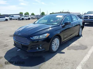 2016 Ford Fusion SE Hybrid with VIN 3FA6P0LU9GR405102, listed as a IAAI auction lot 42358807 with 91,130 mi miles and . Bid and sale history available at DreamBid. Image 2.