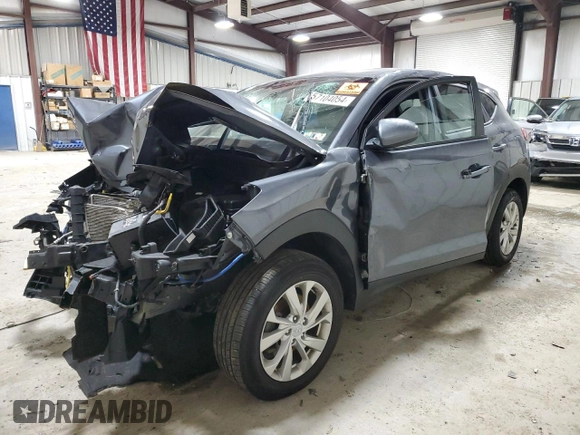2019 Hyundai Tucson SE with VIN KM8J2CA43KU992708, listed as a Copart auction lot 57104054 with 0 mi miles and Non Repairable. Bid and sale history available at carsss.com. Image 1.