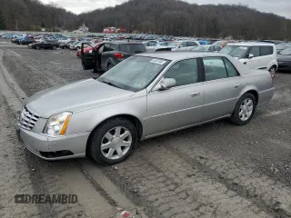 2006 Cadillac DTS 1SC z VIN 1G6KD57Y86U107226, wystawiony jako Copart lot #85987954 z przebiegiem 153 817 mil mil oraz Szkoda całkowita • Salvage title. Historia ofert i sprzedaży dostępna na DreamBid. Obrazek 1.