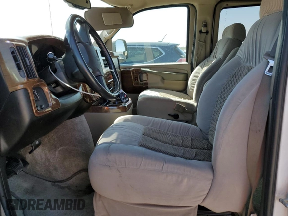 2007 Chevrolet Express Passenger z VIN 1GBFG15T471230597, wystawiony jako Copart lot #46646695 z przebiegiem 154 251 mil mil oraz Szkoda całkowita • Salvage title. Historia ofert i sprzedaży dostępna na DreamBid. Obrazek 7.