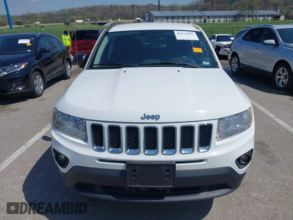 2011 Jeep Compass Latitude with VIN 1J4NT1FB2BD236439, listed as a IAAI auction lot 41935842 with 164,893 mi miles. Bid and sale history available at carsss.com. Image 13.