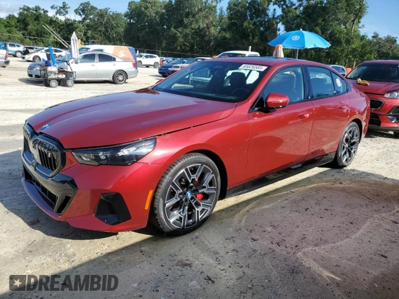 2024 BMW i5 eDrive40 with VIN WBY33FK01RCR76500, listed as a Copart auction lot 65026585 with 3,601 mi miles and Salvage title. Bid and sale history available at DreamBid. Image 1.