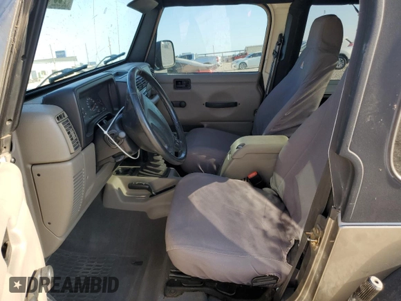 2003 Jeep Wrangler Rubicon with VIN 1J4FA69S73P339925, listed as a Copart auction lot 75341094 with Not provided miles and Salvage title. Bid and sale history available at DreamBid. Image 7.