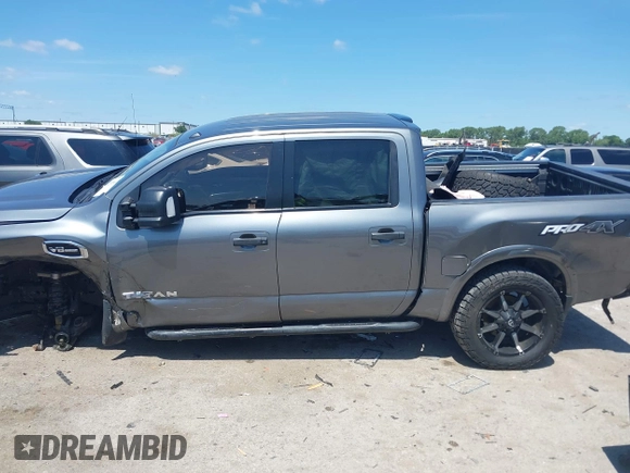 2017 Nissan Titan SV z VIN 1N6AA1E55HN551578, wystawiony jako IAAI lot #42392063 z przebiegiem 123 077 mil mil oraz . Historia ofert i sprzedaży dostępna na DreamBid. Obrazek 15.