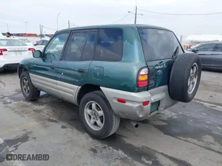 1998 Toyota RAV4 with VIN JT3GP10V9W7032820, listed as a IAAI auction lot 42046186 with 312,888 mi miles. Bid and sale history available at carsss.com. Image 3.