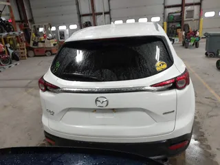 2022 Mazda CX-9 Sport z VIN JM3TCBBYXN0603653, wystawiony jako IAAI lot #42325893 z przebiegiem 57 480 mil mil oraz . Historia ofert i sprzedaży dostępna na DreamBid. Obrazek 16.
