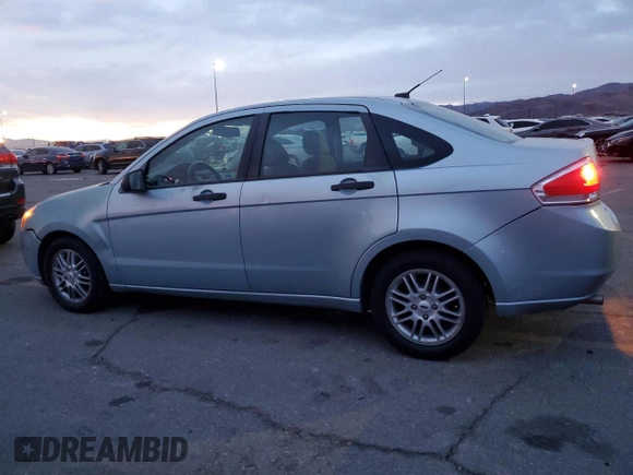 2009 Ford Focus SE with VIN 1FAHP35NX9W224459, listed as a Copart auction lot 86253964 with 120,544 mi miles and Salvage Title. Bid and sale history available at carsss.com. Image 2.