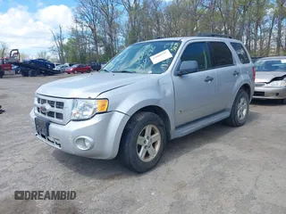 2009 Ford Escape Hybrid with VIN 1FMCU593X9KA36061, listed as a IAAI auction lot 42060150 with 183,184 mi miles. Bid and sale history available at carsss.com. Image 2.