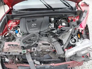 2021 Mazda CX-30 Premium with VIN 3MVDMBDM7MM213754, listed as a IAAI auction lot 42509691 with 61,230 mi miles and . Bid and sale history available at DreamBid. Image 10.
