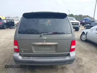 2004 Kia Sedona LX with VIN KNDUP131546543841, listed as a IAAI auction lot 41541012 with 112,122 mi miles. Bid and sale history available at carsss.com. Image 16.