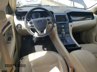 2014 Ford Taurus Limited with VIN 1FAHP2F84EG149622, listed as a Copart auction lot 63764675 with 208,801 mi miles and Salvage title. Bid and sale history available at DreamBid. Image 8.