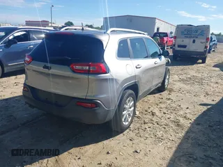 2016 Jeep Cherokee Latitude with VIN 1C4PJLCB7GW351506, listed as a IAAI auction lot 42264579 with 71,021 mi miles and . Bid and sale history available at DreamBid. Image 4.