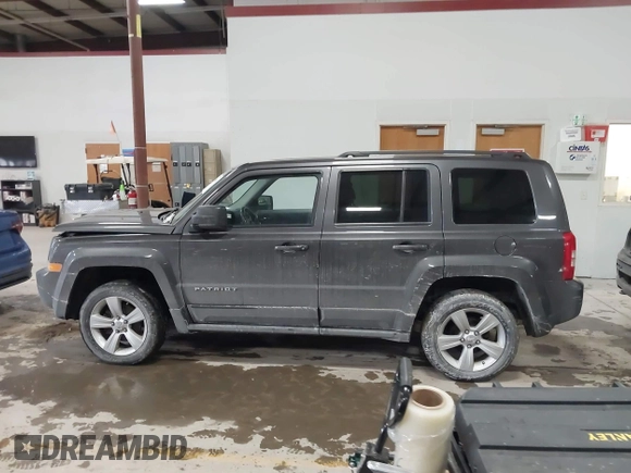 2016 Jeep Patriot High Altitude Edition with VIN 1C4NJRFB0GD632774, listed as a IAAI auction lot 41149683 with 96,495 mi miles. Bid and sale history available at carsss.com. Image 14.