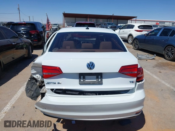 2015 Volkswagen Jetta SE z VIN 3VWD07AJ5FM346565, wystawiony jako IAAI lot #42104880 z przebiegiem 93 491 mil mil oraz . Historia ofert i sprzedaży dostępna na DreamBid. Obrazek 16.