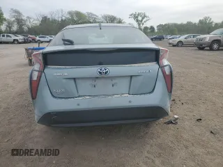 2018 Toyota Prius Two z VIN JTDKBRFUXJ3601563, wystawiony jako Copart lot #55681125 z przebiegiem Nie podano mil oraz Szkoda całkowita • Salvage title. Historia ofert i sprzedaży dostępna na DreamBid. Obrazek 6.