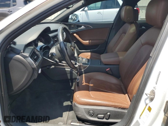 2012 Audi A6 Premium Plus with VIN WAUGGAFC5CN127963, listed as a Copart auction lot 63074335 with 140,979 mi miles and Salvage title. Bid and sale history available at DreamBid. Image 7.