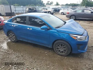 2023 Kia Rio S with VIN 3KPA24AD6PE548027, listed as a Copart auction lot 63697104 with 34,588 mi miles and Salvage Title. Bid and sale history available at carsss.com. Image 4.