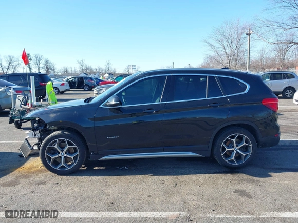 2018 BMW X1 xDrive28i with VIN WBXHT3C36J5F91110, listed as a IAAI auction lot 41757293 with 80,327 mi miles. Bid and sale history available at carsss.com. Image 14.