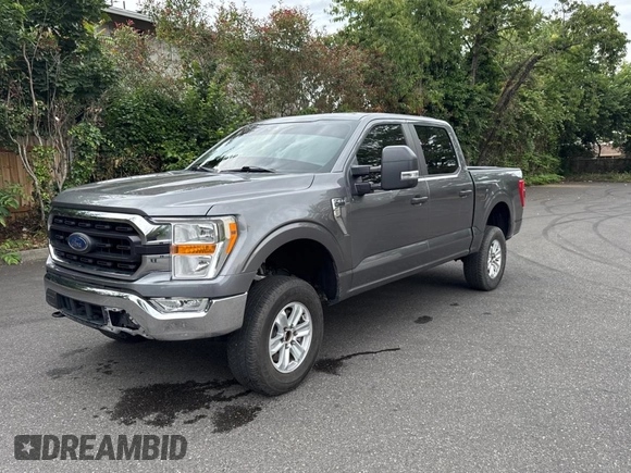 2021 Ford F-150 XL with VIN 1FTFW1E86MKD57397, listed as a Copart auction lot 62959355 with 59,227 mi miles and Salvage title. Bid and sale history available at DreamBid. Image 2.