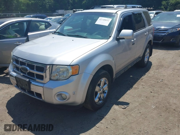 2010 Ford Escape Limited z VIN 1FMCU9EG7AKC87480, wystawiony jako IAAI lot #42748832 z przebiegiem 86 566 mil mil oraz . Historia ofert i sprzedaży dostępna na DreamBid. Obrazek 2.