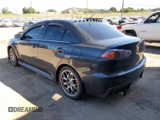 2015 Mitsubishi Lancer Evolution MR z VIN JA32W5FV5FU006111, wystawiony jako Copart lot #68985683 z przebiegiem 54 774 mil mil oraz . Historia ofert i sprzedaży dostępna na DreamBid. Obrazek 2.