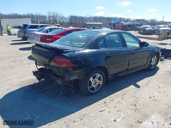 2004 Pontiac Grand Am GT with VIN 1G2NW52E74M683389, listed as a IAAI auction lot 41810159 with 227,091 mi miles. Bid and sale history available at carsss.com. Image 4.