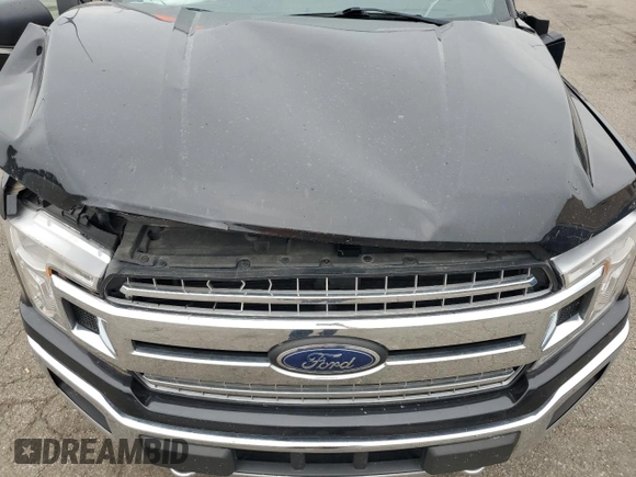 2019 Ford F-150 XL с VIN 1FTEW1E43KKF31108, выставлен на аукционе Copart как лот 63795285 с пробегом Не указан миль и Списание • Salvage title. История ставок и продаж доступна на DreamBid. Изображение 11.