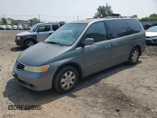 2002 Honda Odyssey EX-L z VIN 5FNRL18912B031379, wystawiony jako Copart lot #59820215 z przebiegiem 196 150 mil mil oraz Czysty tytuł • Clean title. Historia ofert i sprzedaży dostępna na DreamBid. Obrazek 1.