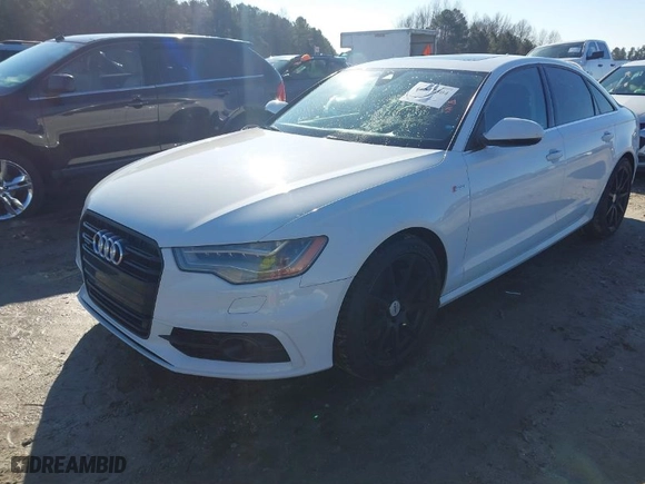2012 Audi A6 3.0T Prestige with VIN WAUHGAFC8CN112409, listed as a IAAI auction lot 41577304 with 123,759 mi miles. Bid and sale history available at carsss.com. Image 2.