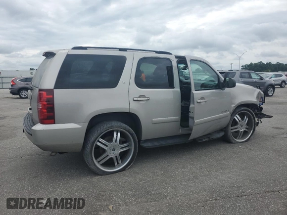 2007 Chevrolet Tahoe LT with VIN 1GNFK13097J102978, listed as a Copart auction lot 60197915 with Not provided miles and Salvage title. Bid and sale history available at DreamBid. Image 3.
