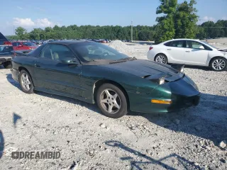 1993 Pontiac Firebird Formula z VIN 2G2FV22P7P2213963, wystawiony jako Copart lot #62092405 z przebiegiem 123 385 mil mil oraz Czysty tytuł • Clean title. Historia ofert i sprzedaży dostępna na DreamBid. Obrazek 5.