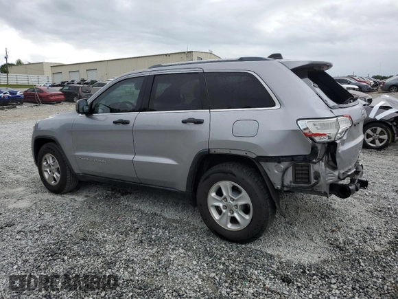 2014 Jeep Grand Cherokee Laredo with VIN 1C4RJEAG2EC179547, listed as a Copart auction lot 53328055 with 107,451 mi miles and Salvage Title. Bid and sale history available at DreamBid. Image 2.