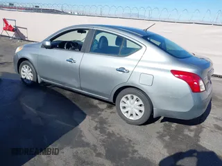 2012 Nissan Versa SV with VIN 3N1CN7AP0CL921230, listed as a IAAI auction lot 42151993 with 184,676 mi miles. Bid and sale history available at carsss.com. Image 3.