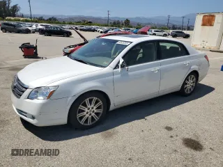 2005 Toyota Avalon XL z VIN 4T1BK36B95U038027, wystawiony jako Copart lot #60635855 z przebiegiem 167 667 mil mil oraz Szkoda całkowita • Salvage title. Historia ofert i sprzedaży dostępna na DreamBid. Obrazek 1.