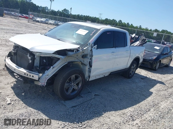 2022 Honda Ridgeline RTL with VIN 5FPYK3F51NB025152, listed as a IAAI auction lot 42325957 with 54,632 mi miles and . Bid and sale history available at DreamBid. Image 17.