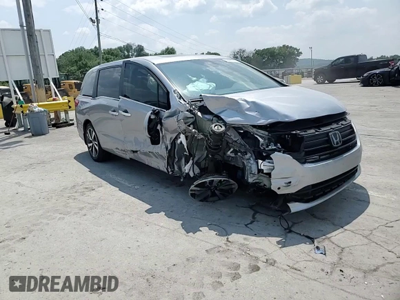 2023 Honda Odyssey Touring z VIN 5FNRL6H8XPB037385, wystawiony jako Copart lot #59461215 z przebiegiem 32 150 mil mil oraz Szkoda całkowita • Salvage title. Historia ofert i sprzedaży dostępna na DreamBid. Obrazek 14.