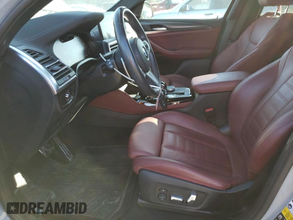 2023 BMW X4 M40i with VIN 5UX43DT00P9R86047, listed as a Copart auction lot 47321295 with 21,640 mi miles and Salvage title. Bid and sale history available at DreamBid. Image 7.
