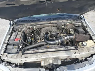 2003 Ford F-150 XL with VIN 1FTRX18L23NA66919, listed as a Copart auction lot 52911285 with 153,870 mi miles and Salvage Title. Bid and sale history available at carsss.com. Image 11.