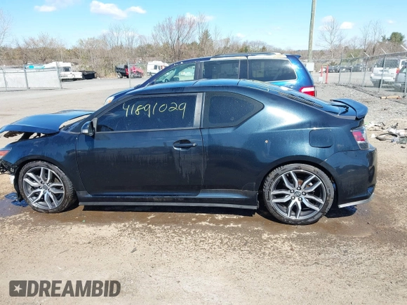 2016 Scion tC with VIN JTKJF5C71GJ020893, listed as a IAAI auction lot 41891029 with 76,341 mi miles. Bid and sale history available at carsss.com. Image 15.