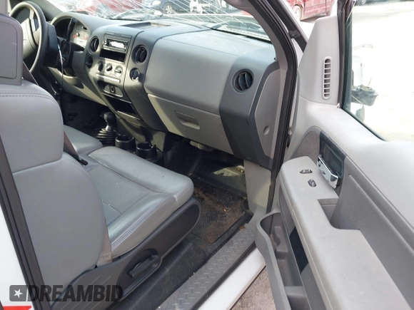 2005 Ford F-150 STX with VIN 1FTRX14W85FB72787, listed as a IAAI auction lot 41702370 with 210,544 mi miles. Bid and sale history available at carsss.com. Image 5.