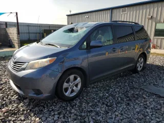 2014 Toyota Sienna LE AAS with VIN 5TDKK3DC5ES521535, listed as a Copart auction lot 64442955 with 122,459 mi miles and Salvage title. Bid and sale history available at DreamBid. Image 1.