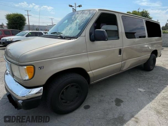 1999 Ford Econoline Passenger XL with VIN 1FMRE11L6XHB70992, listed as a Copart auction lot 78546004 with 264,378 mi miles and Clean title. Bid and sale history available at DreamBid. Image 2.